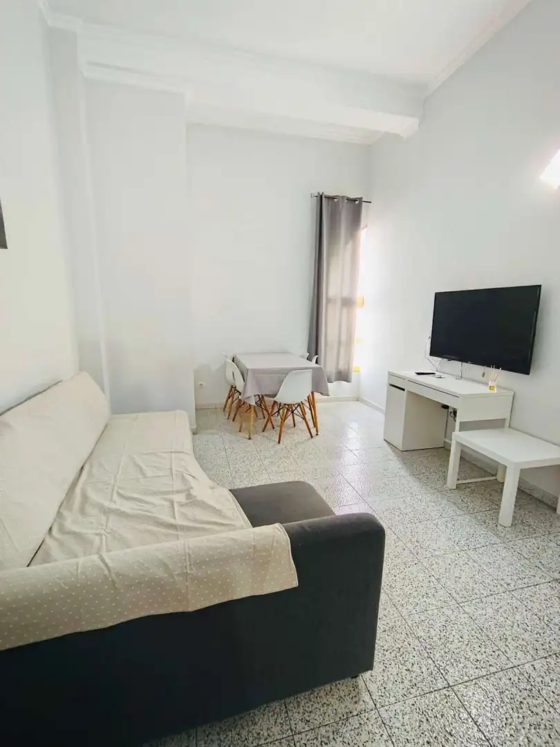 Sala d'estar de Apartament per a compartir en San Bartolomé de Tirajana amb Aire condicionat, Terrassa i Moblat