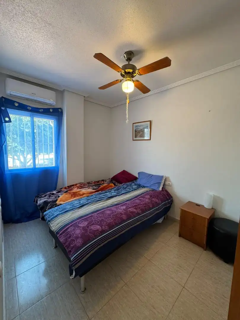 Habitación de Apartamento en venta en Almoradí con Aire acondicionado, Amueblado y Piscina comunitaria