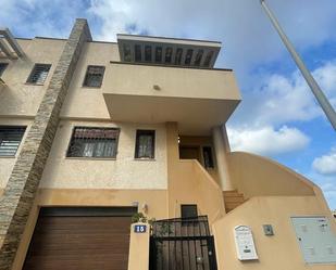 Exterior view of Single-family semi-detached for sale in  Melilla Capital  with Air Conditioner, Terrace and Swimming Pool