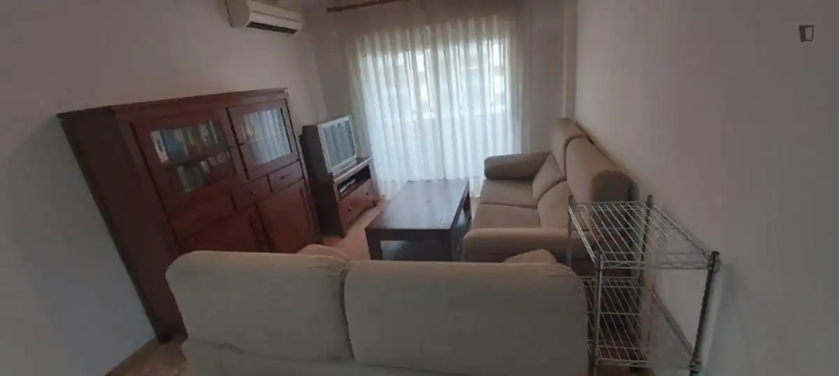 Sala d'estar de Apartament per a compartir en Castellón de la Plana / Castelló de la Plana amb Aire condicionat, Moblat i Forn