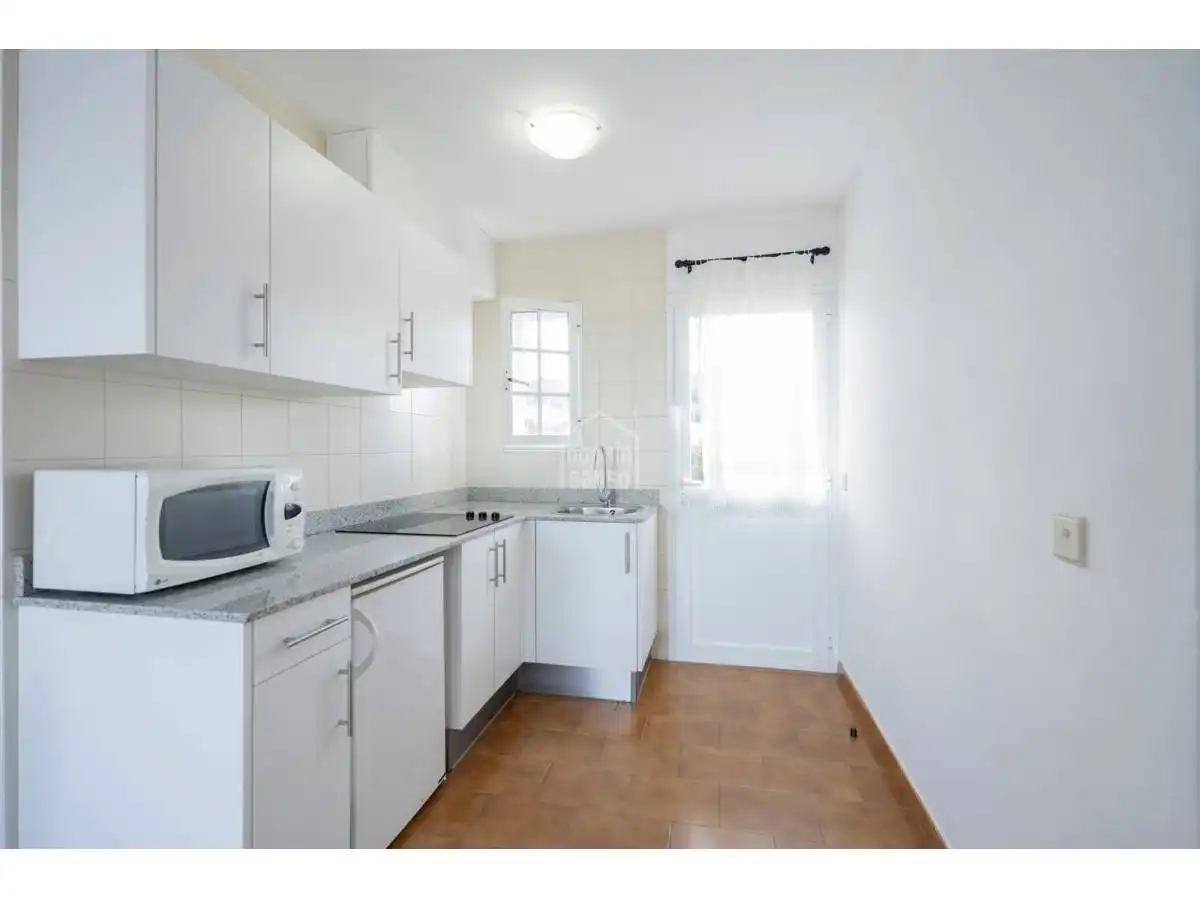 Cuina de Apartament en venda en Es Mercadal amb Jardí privat, Terrassa i Piscina