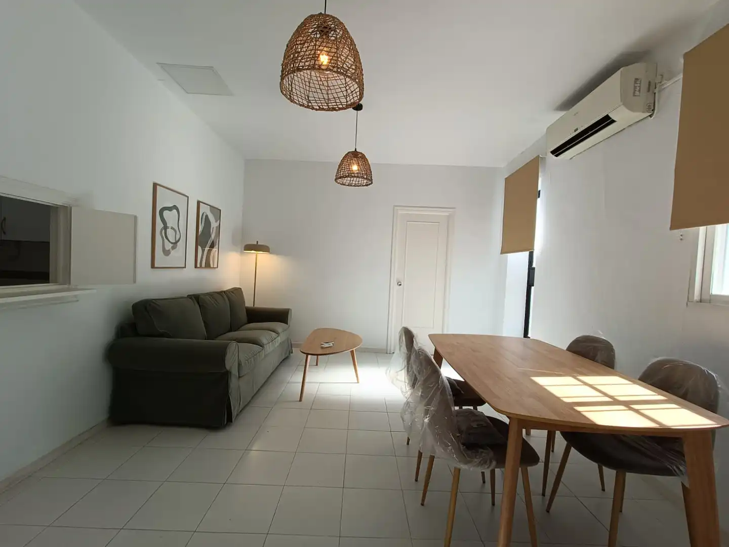 Sala d'estar de Àtic de lloguer en Sevilla amb Aire condicionat, Terrassa i Moblat