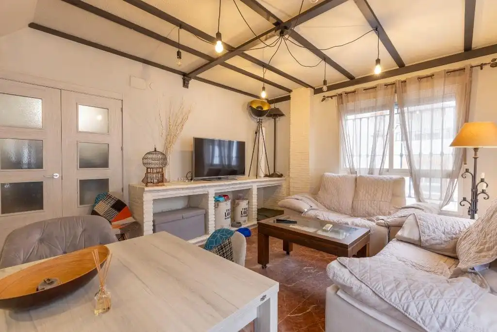 Sala de estar de Casa adosada en venta en Granada con Terraza