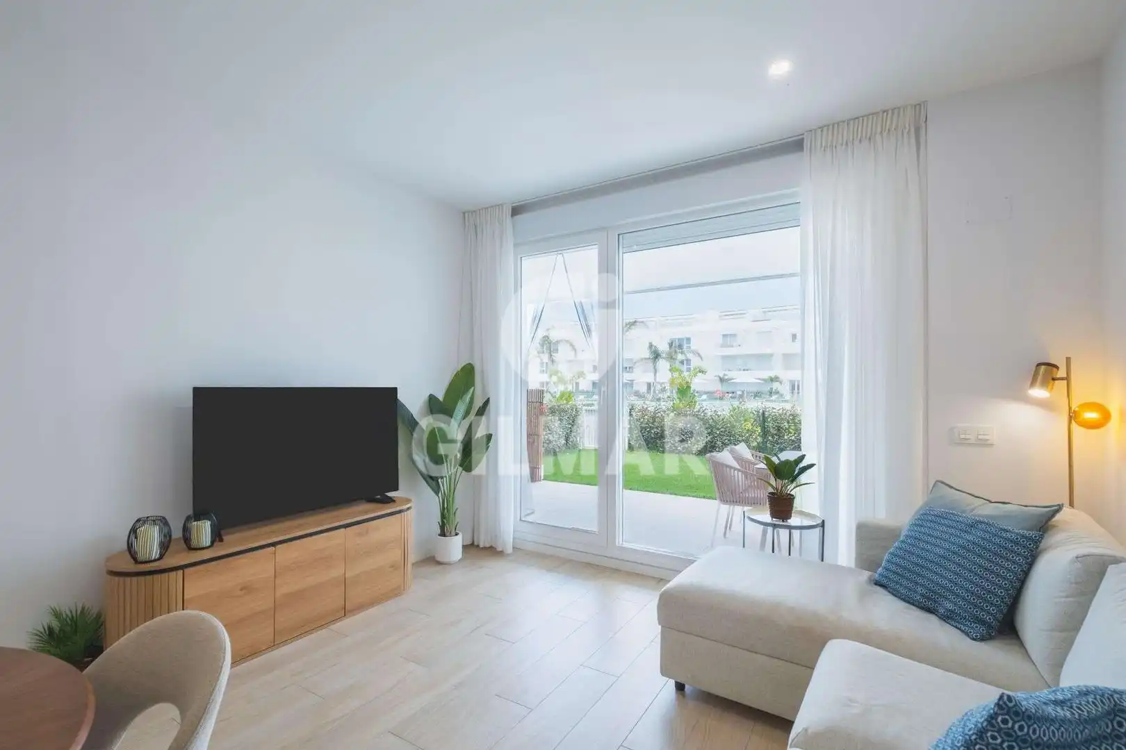 Wohnzimmer von Wohnung zur Miete in Chipiona mit Klimaanlage, Privatgarten und Möbliert