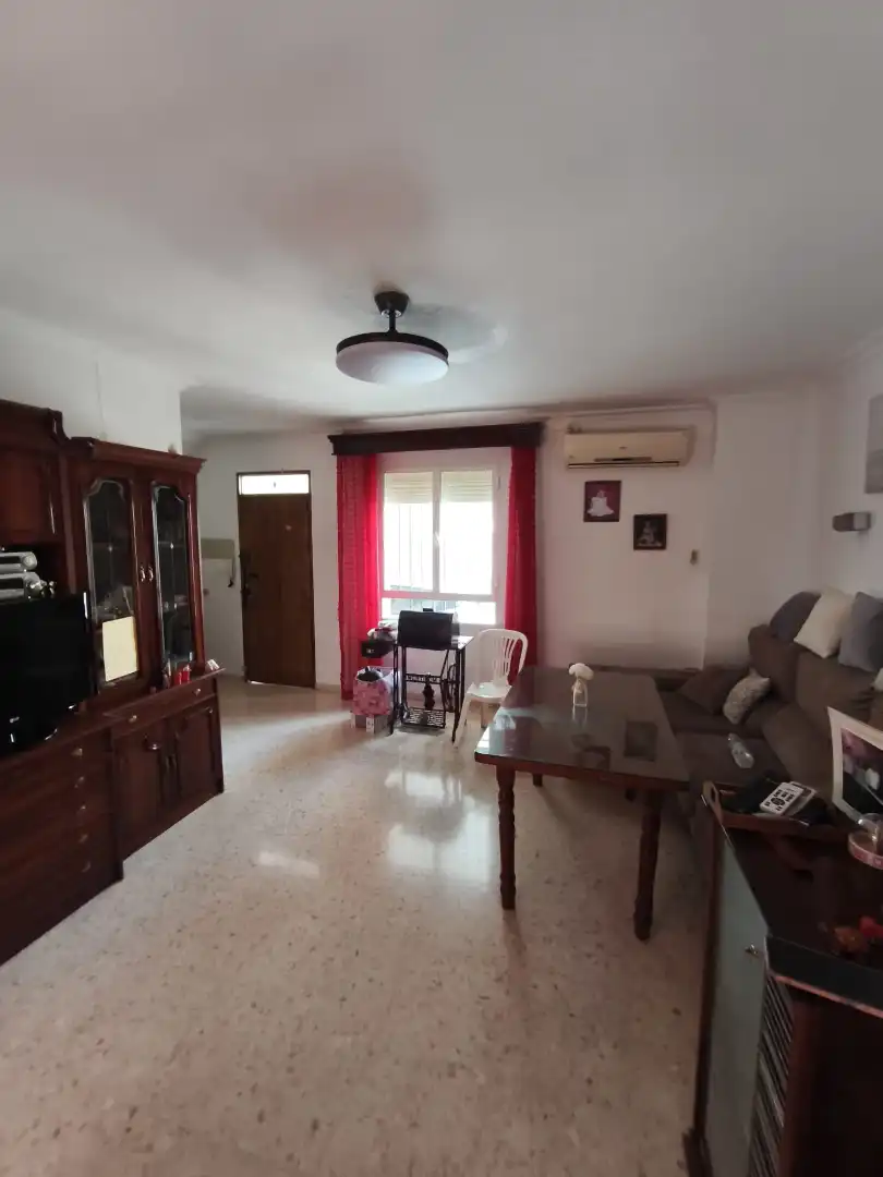 Sala de estar de Casa adosada en venta en Utrera con Amueblado