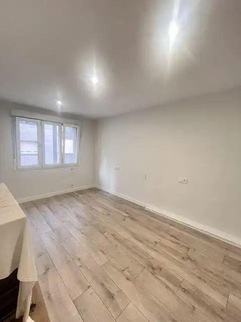 Bedroom of Flat for rent in Gijón   with Heating