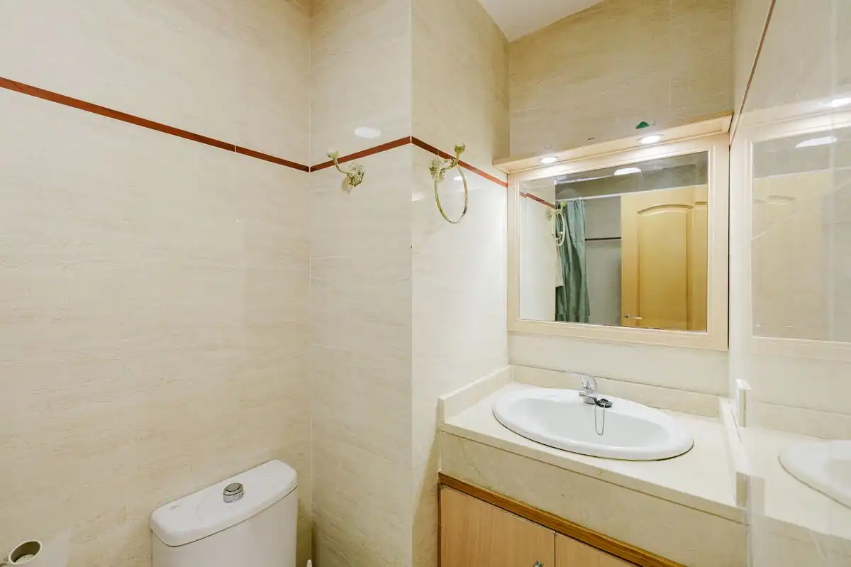 Bathroom of Flat for sale in Nerja  with Air Conditioner, Heating and Storage room