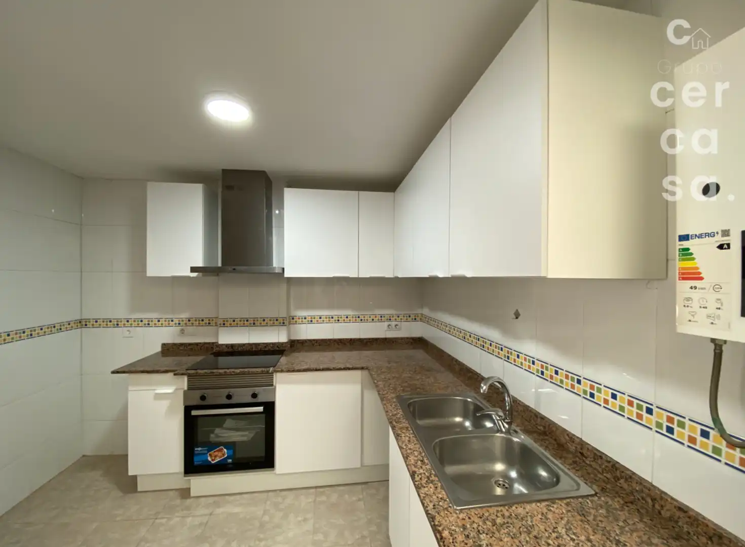 Cocina de Casa adosada en venta en Tavernes Blanques con Terraza, Trastero y Balcón