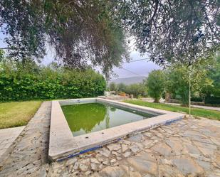 Swimming pool of Country house for sale in Olvera  with Air Conditioner, Private garden and Storage room
