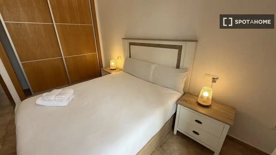 Dormitori de Apartament per a compartir en Málaga amb Aire condicionat, Terrassa i Moblat