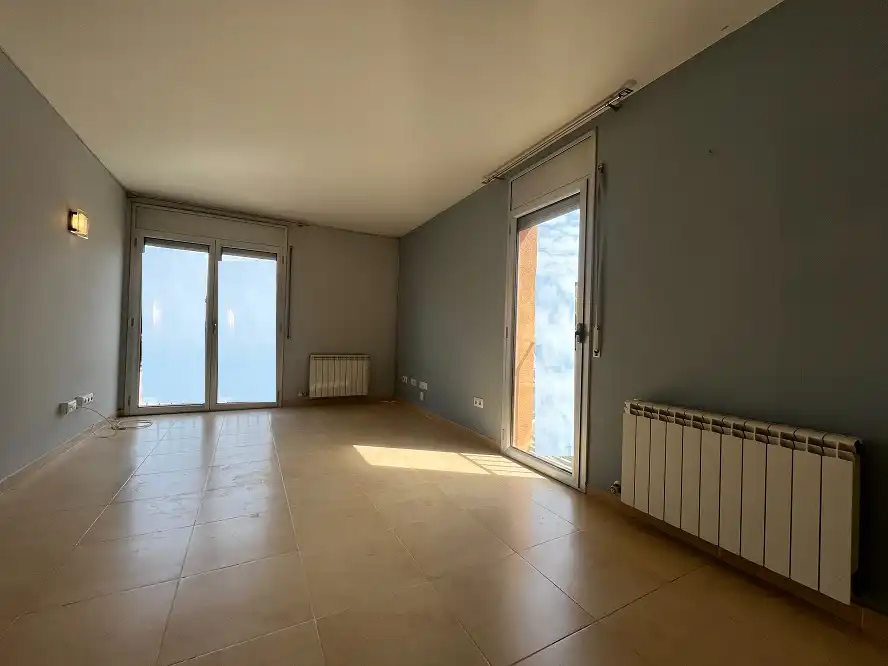 Sala d'estar de Pis en venda en Riudellots de la Selva amb Calefacció i Alarma