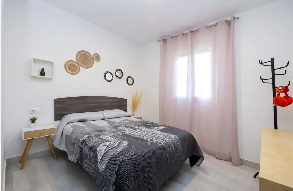 Habitación de Casa o chalet en venta en La Zubia con Aire acondicionado, Calefacción y Jardín privado