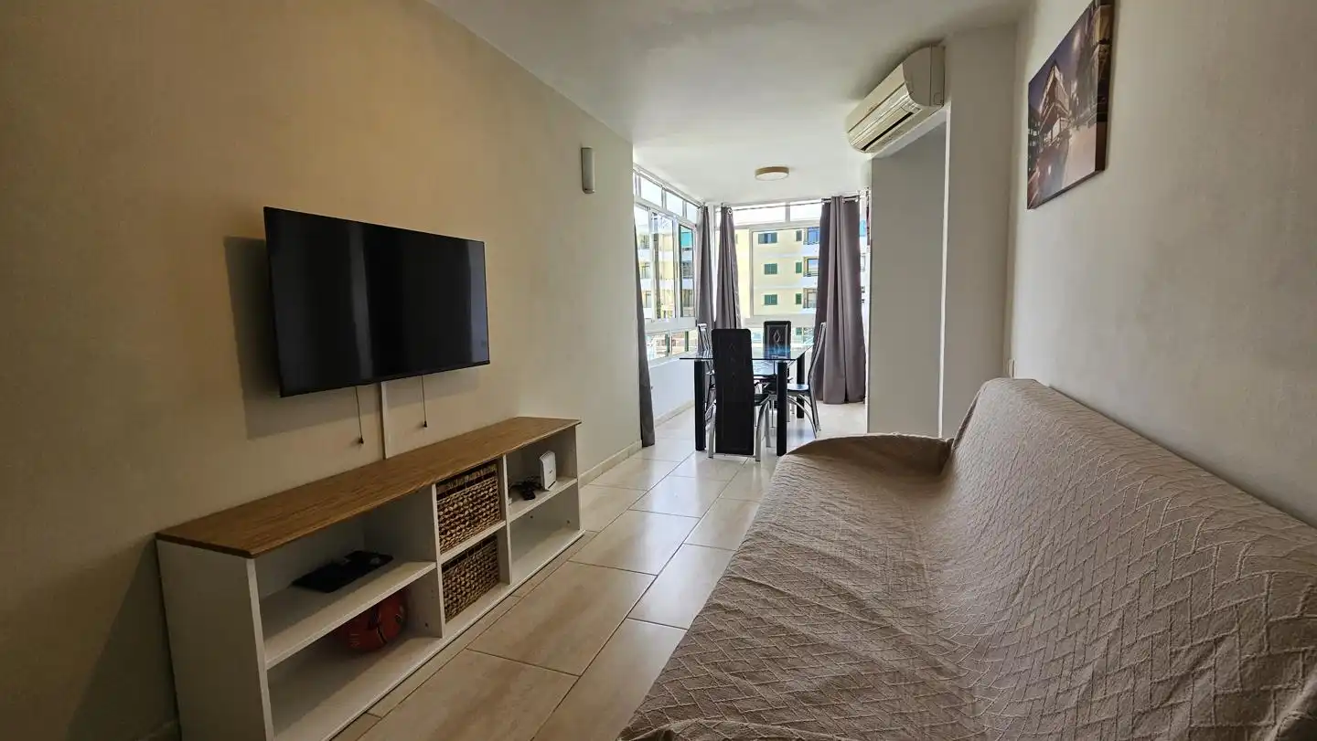 Living room of Flat for sale in San Bartolomé de Tirajana  with Air Conditioner, Furnished and Community pool