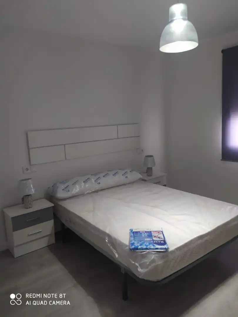 Schlafzimmer von Wohnung zur Miete in Huelva mit Möbliert, Waschmaschine und Balkon