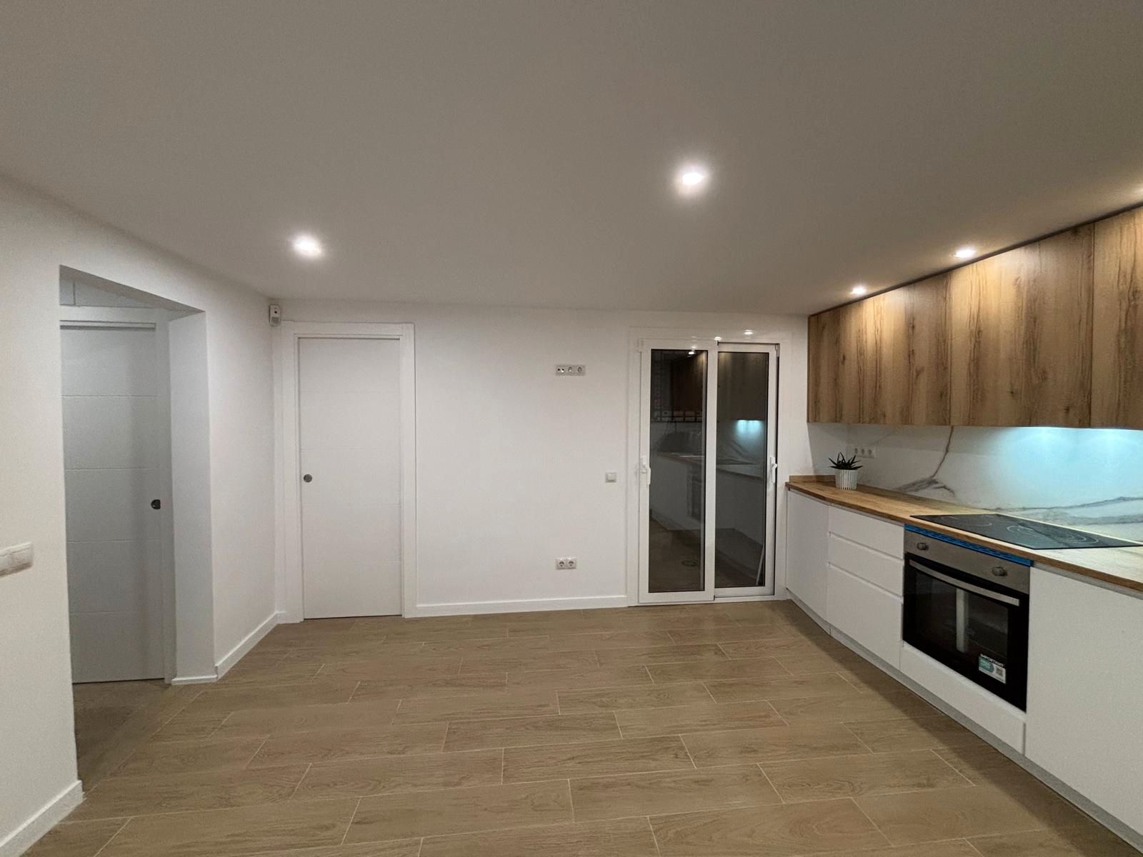 Erdgeschoss zum Verkauf in Lloret de Mar mit Parkett, Terrasse und Ofen