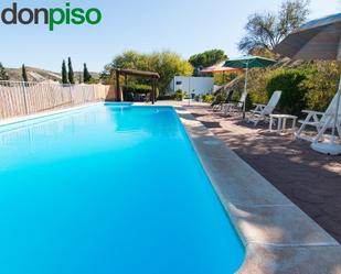 Swimming pool of Building for sale in Huétor Tájar