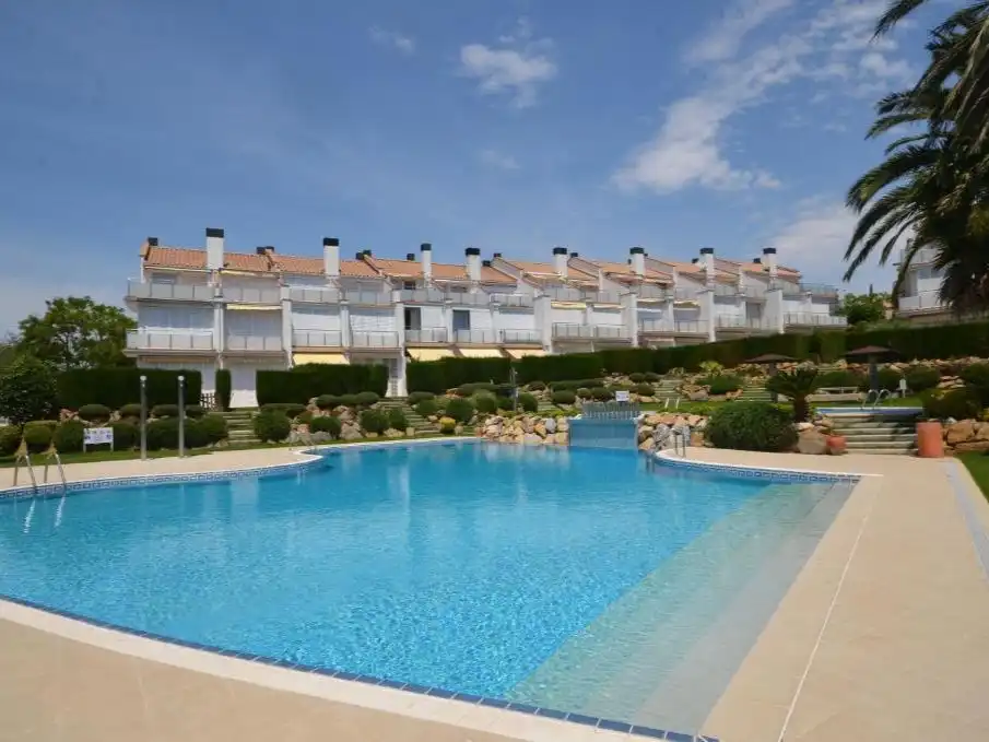 Piscina de Casa adosada en venda en Castell d'Aro, Platja d'Aro i s'Agaró amb Calefacció, Jardí privat i Terrassa
