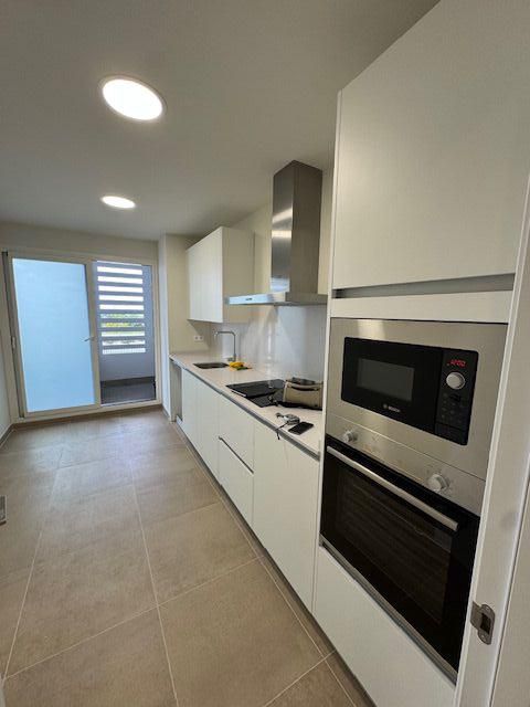 Kitchen of Flat to rent in Dos Hermanas  with Air Conditioner, Terrace and Storage room