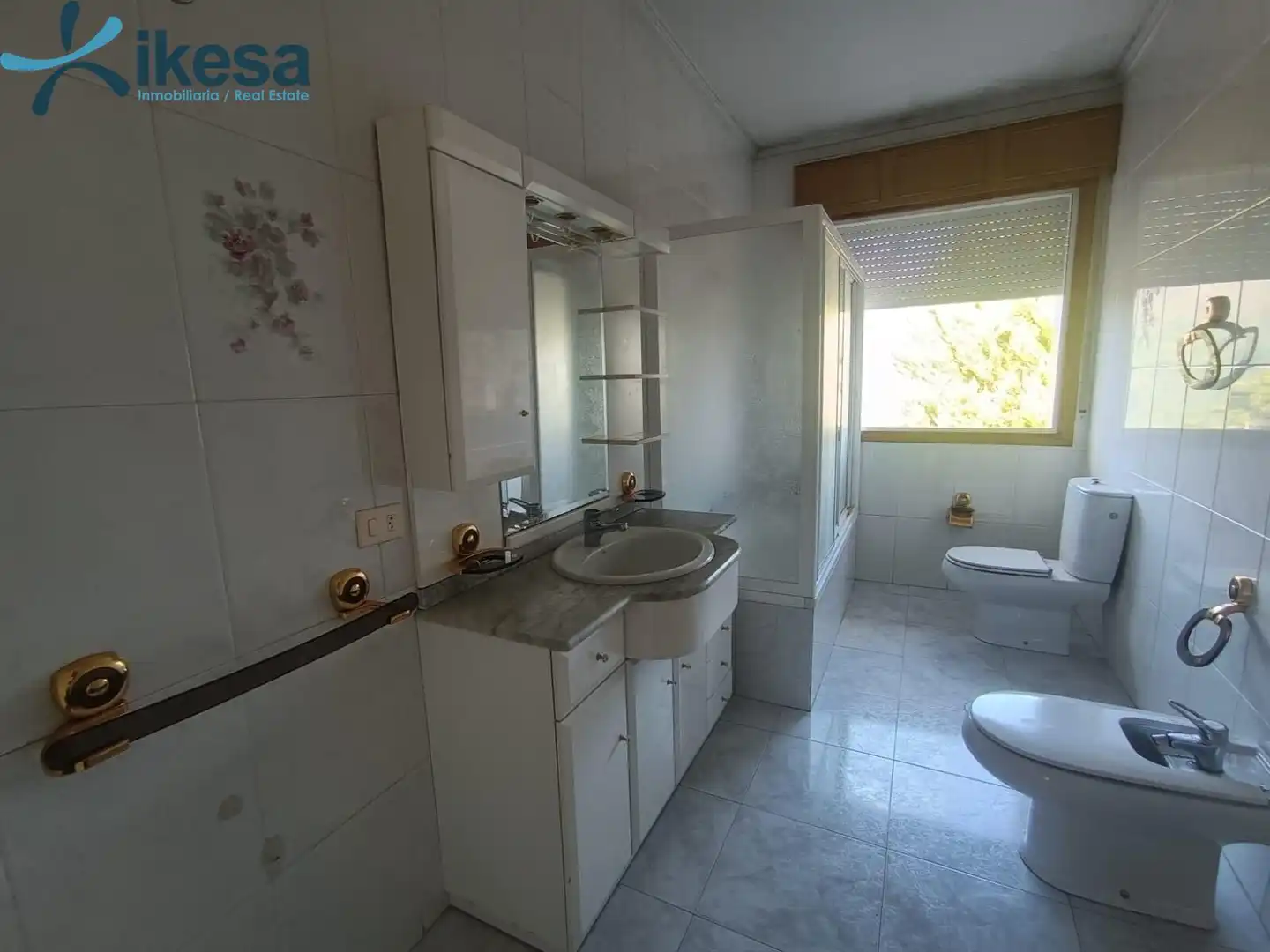 Bany de Casa o xalet en venda en Entrimo amb Jardí privat