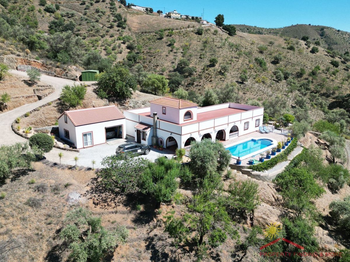 Exterior view of Country house for sale in Sedella  with Private garden, Storage room and Swimming Pool