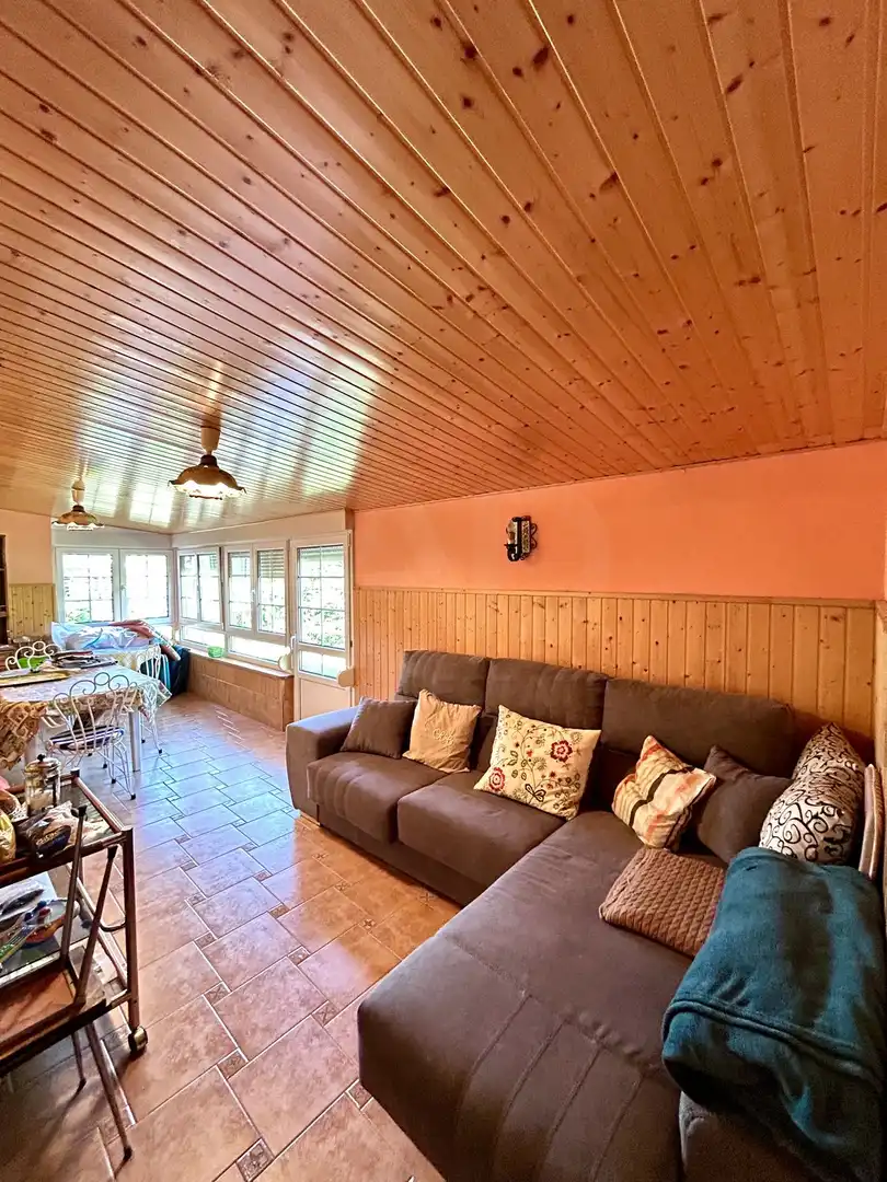 Sala de estar de Casa o chalet en venta en Villadangos del Páramo con Calefacción, Terraza y Piscina