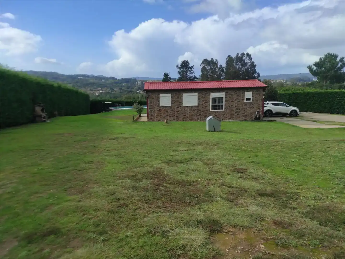 Vista exterior de Planta baixa en venda en Cambre  amb Jardí privat, Piscina i Moblat