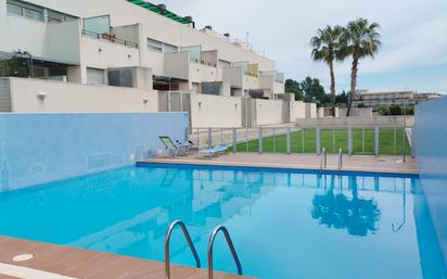 Swimming pool of Duplex for sale in Alcanar  with Air Conditioner, Terrace and Storage room