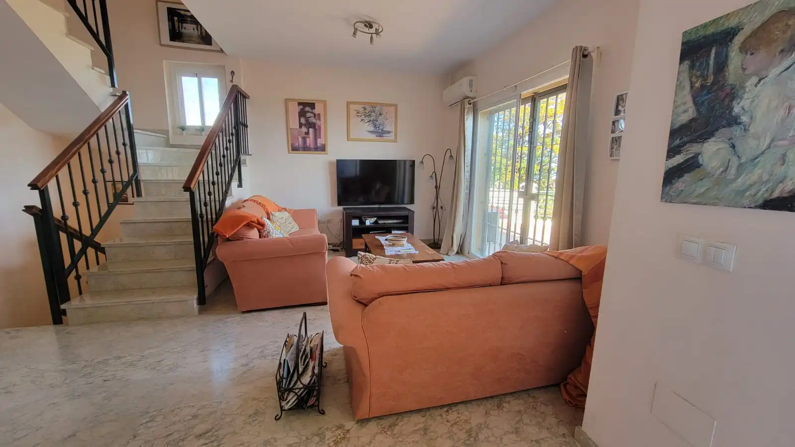 Sala de estar de Casa adosada en venta en Vélez-Málaga con Aire acondicionado y Piscina comunitaria