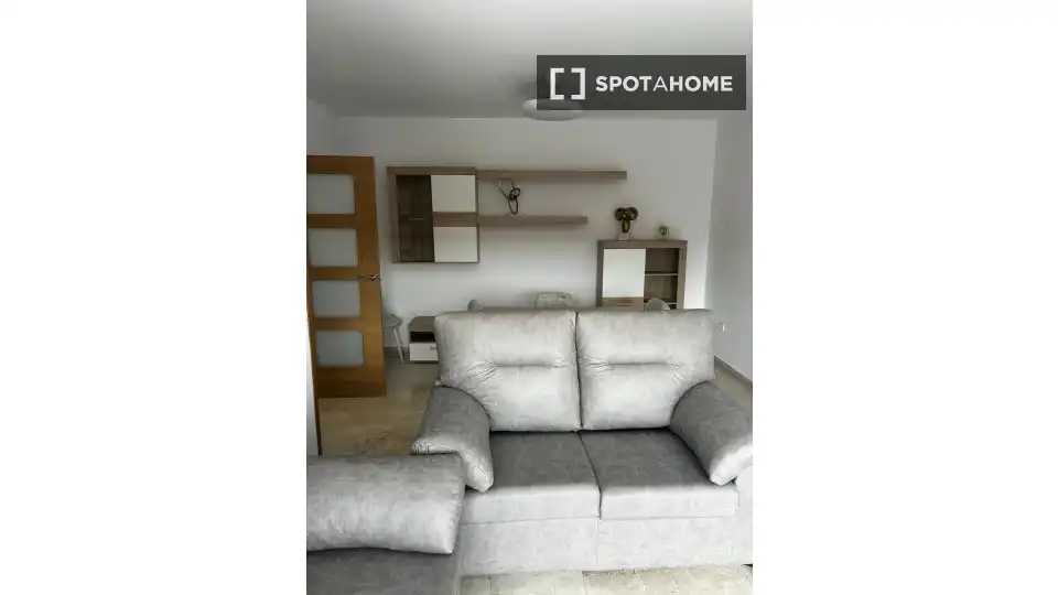 Sala de estar de Piso para compartir en Granada con Aire acondicionado, Calefacción y Amueblado