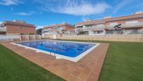 Swimming pool of Single-family semi-detached for sale in Creixell  with Air Conditioner and Terrace