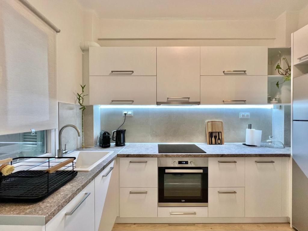 Cocina de Piso de alquiler en  Sevilla Capital con Aire acondicionado, Amueblado y TV