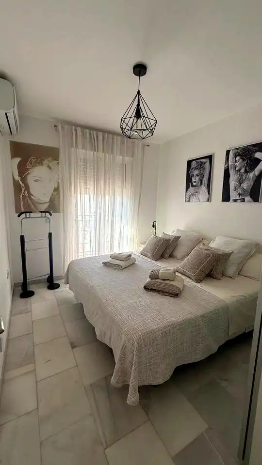 Habitación de Casa adosada en venta en Málaga con Aire acondicionado y Piscina comunitaria