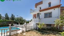 Exterior view of House or chalet for sale in Ogíjares  with Air Conditioner, Terrace and Swimming Pool