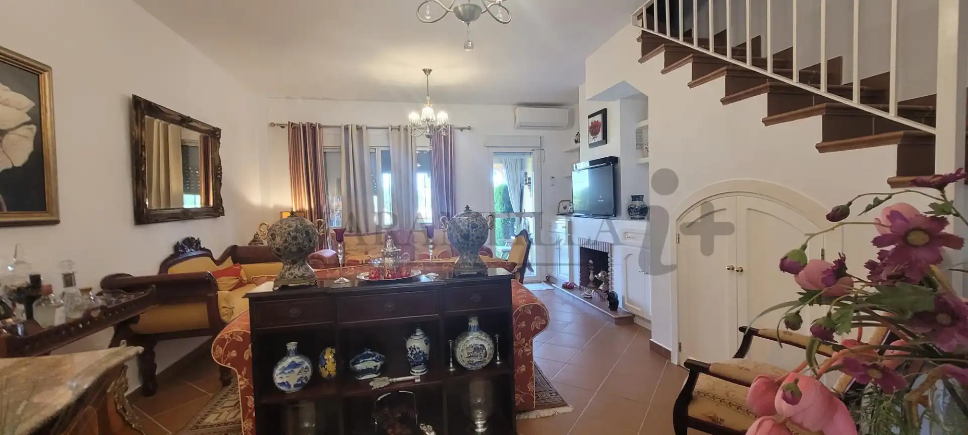 Sala de estar de Casa adosada en venta en Islantilla con Aire acondicionado, Calefacción y Jardín privado