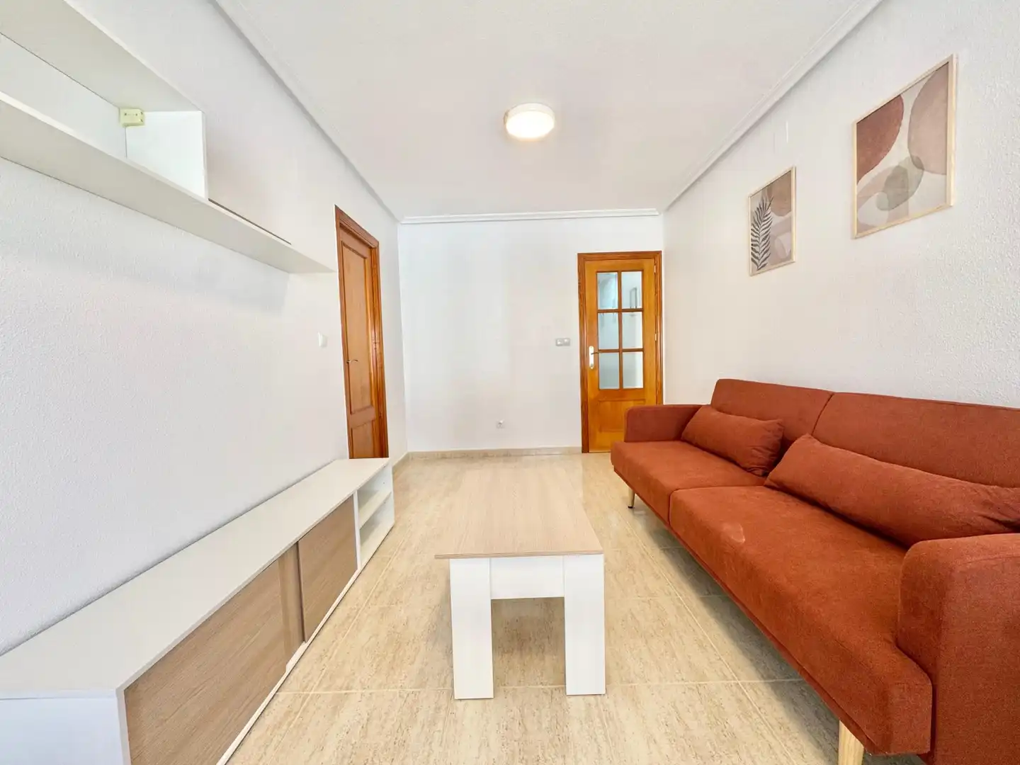 Sala d'estar de Apartament de lloguer en Guardamar del Segura amb Aire condicionat, Moblat i Rentadora