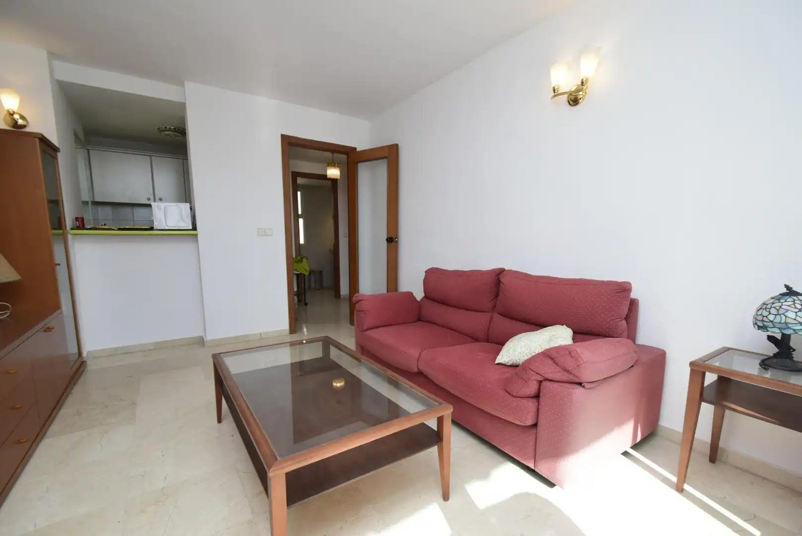 Sala de estar de Apartamento en venta en Benidorm con Amueblado y Piscina comunitaria