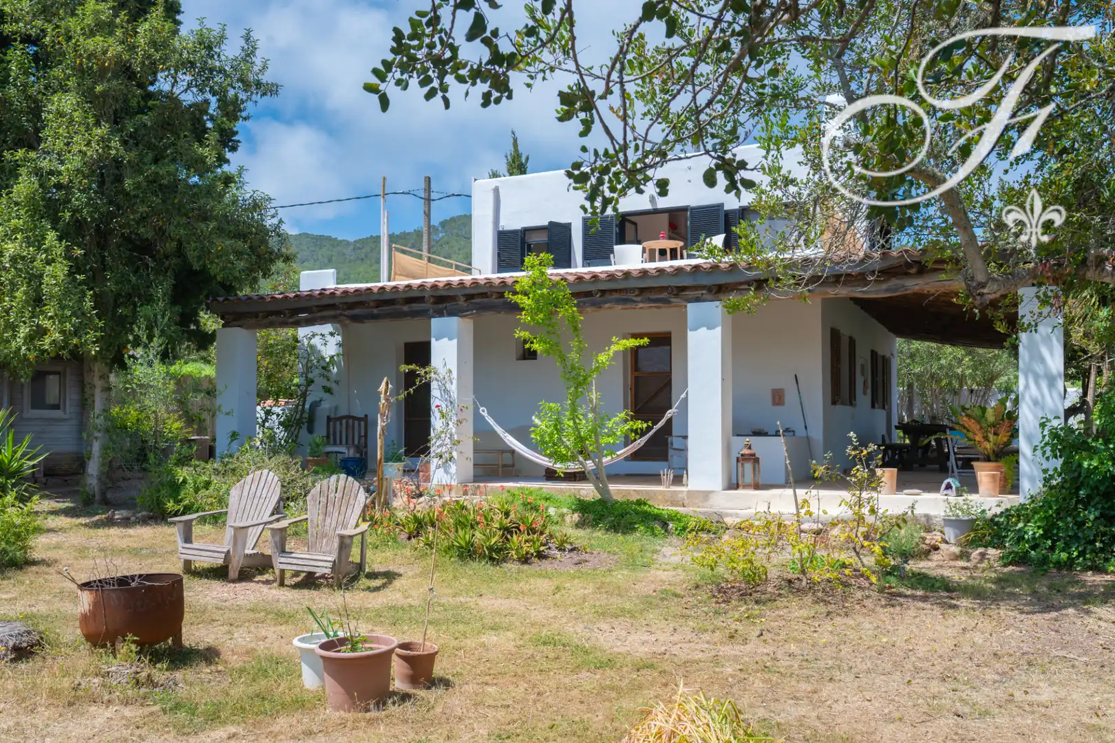 Casa rústica amb jardí en venda a Sant Antoni de Portmany