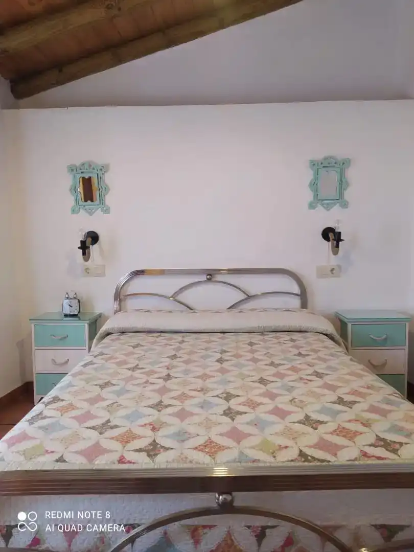 Dormitori de Casa adosada de lloguer en Aracena amb Moblat, Forn i Rentadora