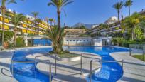 Exterior view of Planta baja for sale in Marbella  with Air Conditioner, Terrace and Swimming Pool