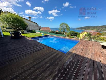 Swimming pool of House or chalet for sale in Cangas   with Heating, Terrace and Swimming Pool