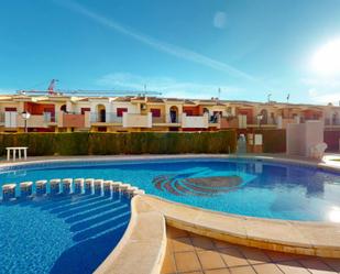 Swimming pool of Apartment for sale in Torrevieja  with Air Conditioner, Terrace and Furnished