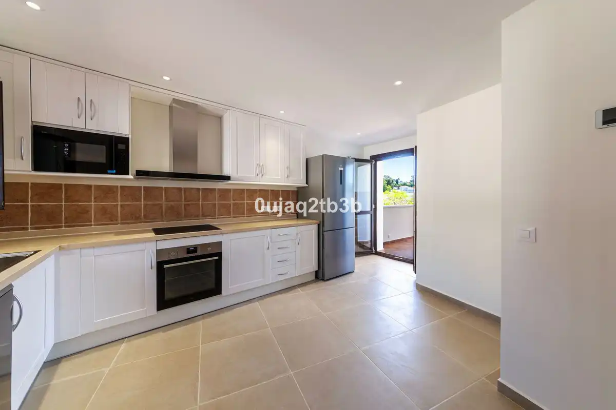 Cocina de Casa adosada de alquiler en Estepona con Aire acondicionado, Jardín privado y Terraza