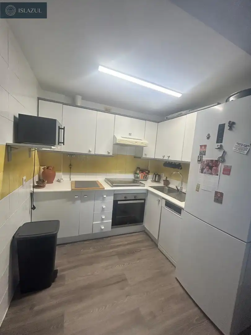 Cuina de Apartament en venda en Isla Cristina amb Aire condicionat, Jardí privat i Terrassa