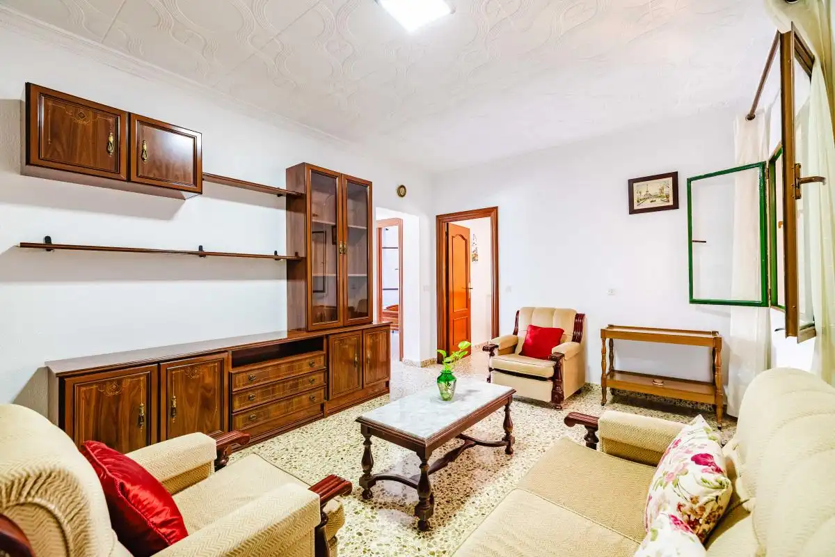 Sala d'estar de Casa adosada en venda en Málaga amb Aire condicionat, Calefacció i Terrassa