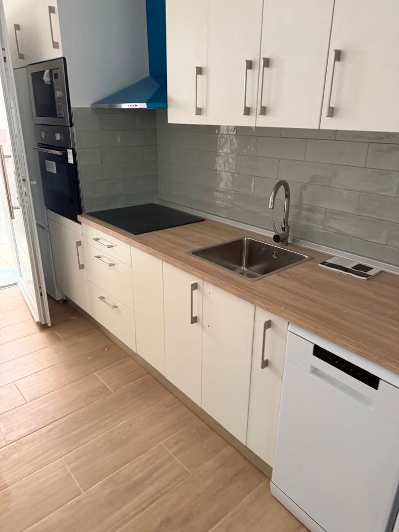 Küche von Wohnungen zum Verkauf in Argés mit Klimaanlage, Heizung und Ofen