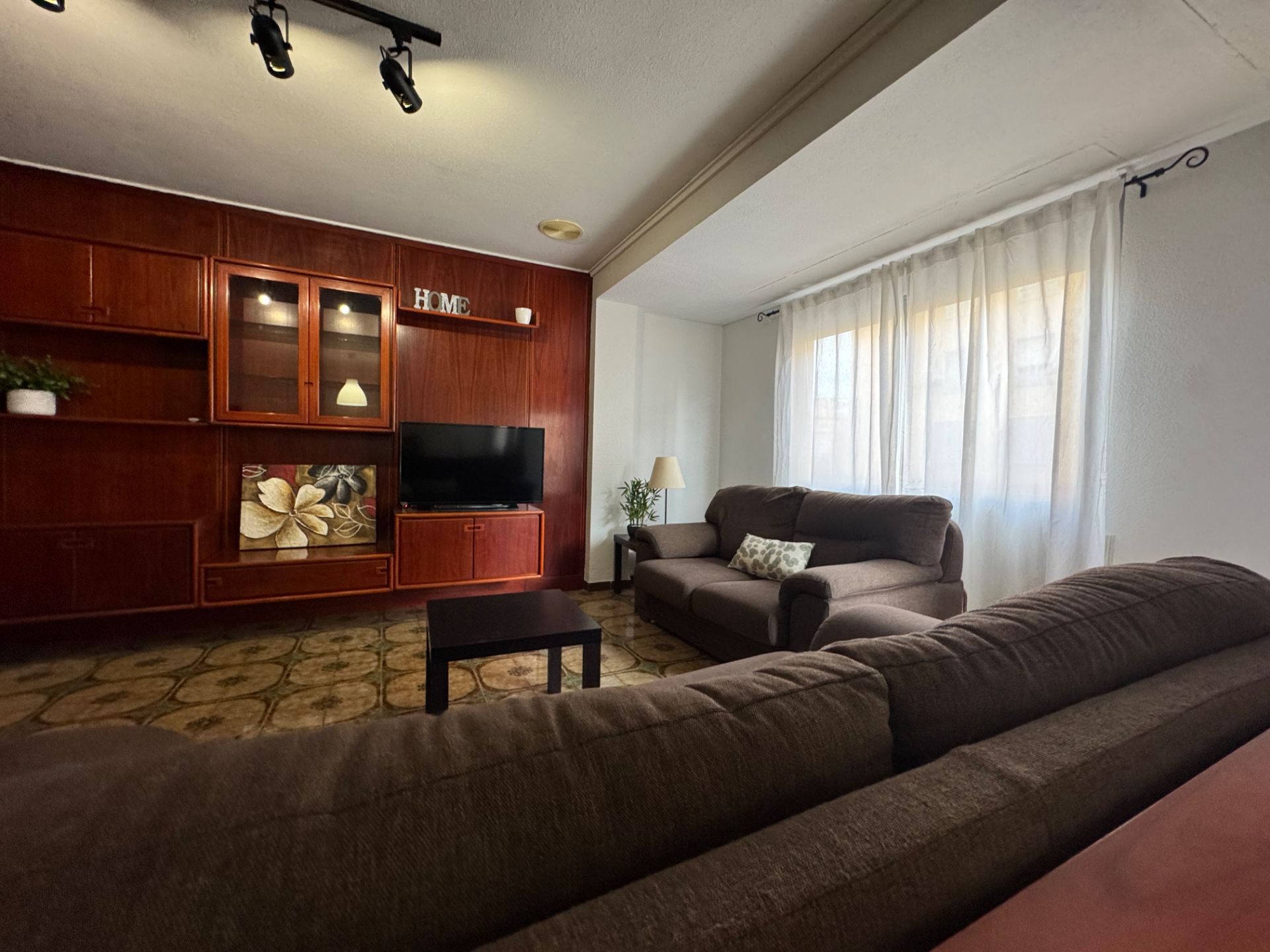 Sala de estar de Piso en venta en Gandia con Amueblado, TV y Balcón