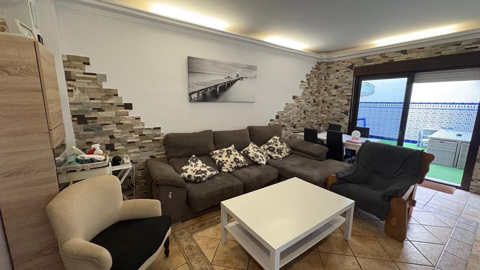 Sala d'estar de Casa adosada en venda en Chiclana de la Frontera