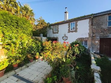 Maison mitoyenne avec jardin à vendre à RUA. CUIÑA