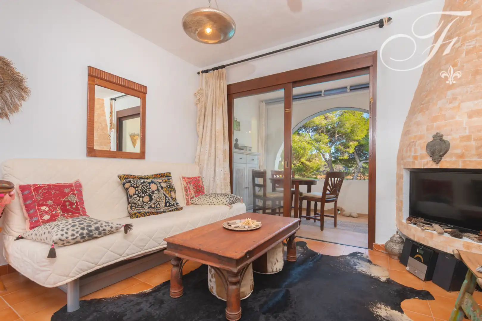 Sala de estar de Apartamento en venta en Santa Eulària des Riu con Aire acondicionado, Terraza y Piscina comunitaria
