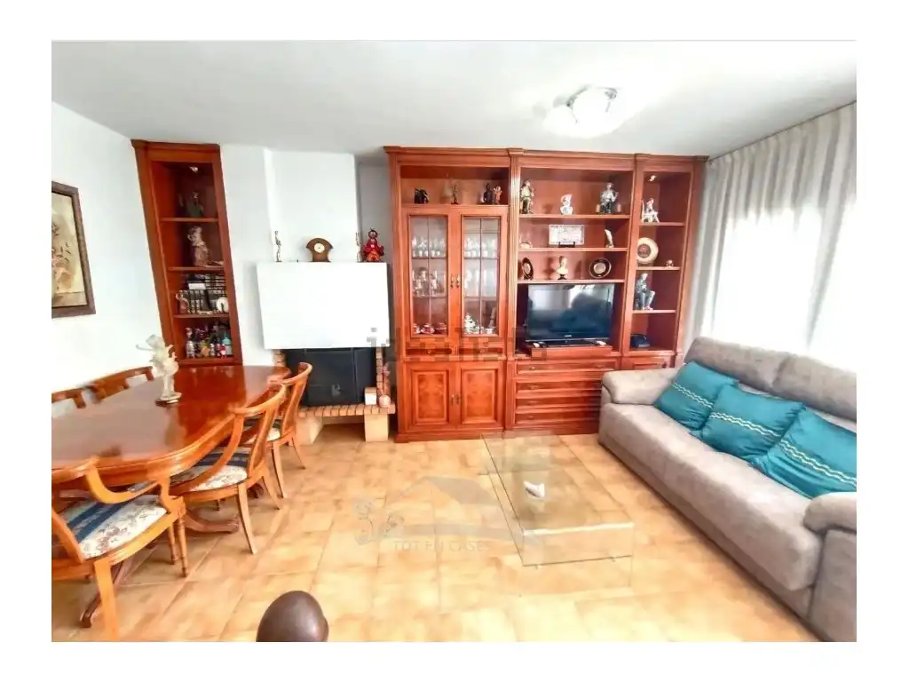 Sala d'estar de Casa o xalet en venda en Cunit amb Aire condicionat i Jardí privat